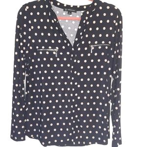Woman's black-and-white polka blouse
